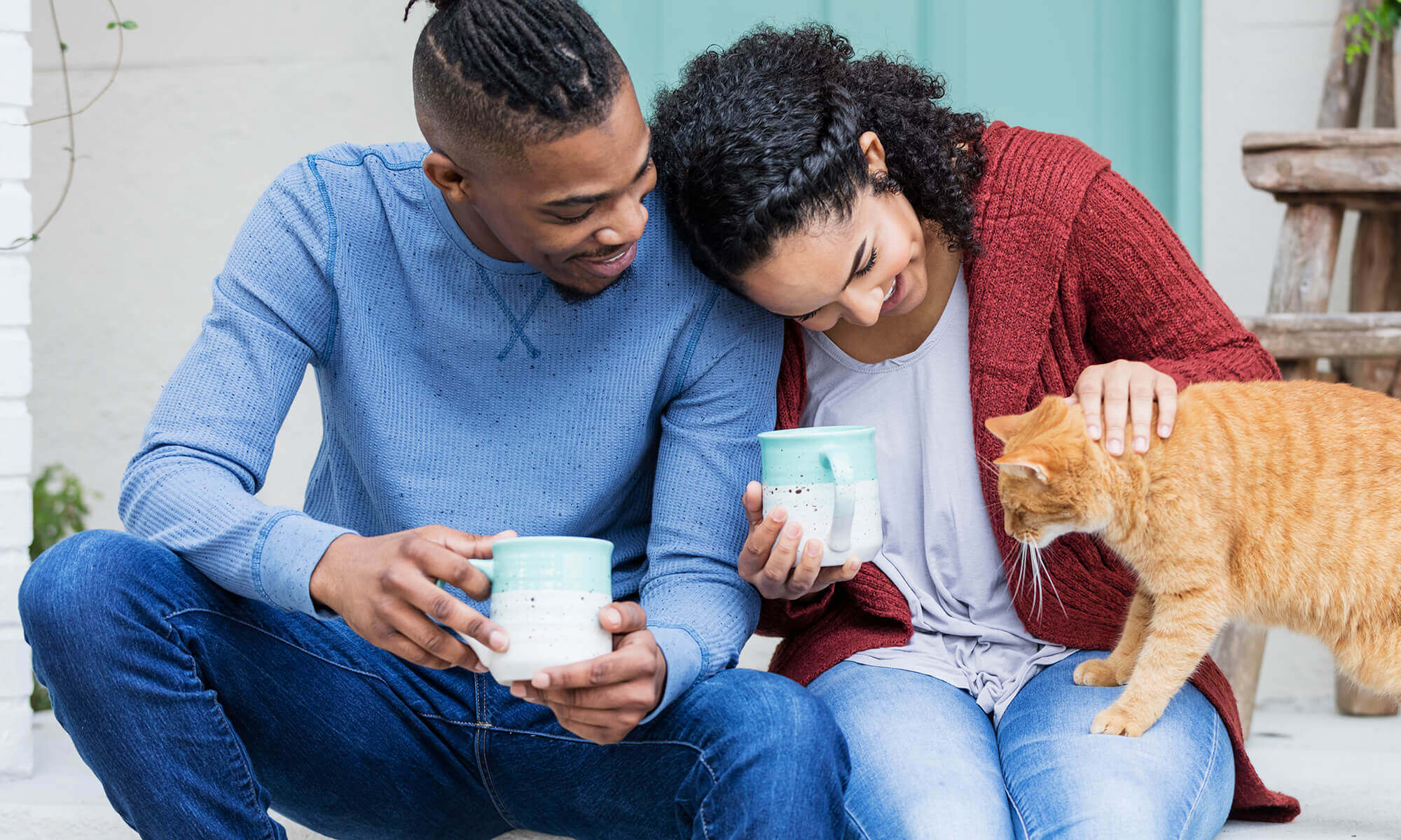 A couple with a cat